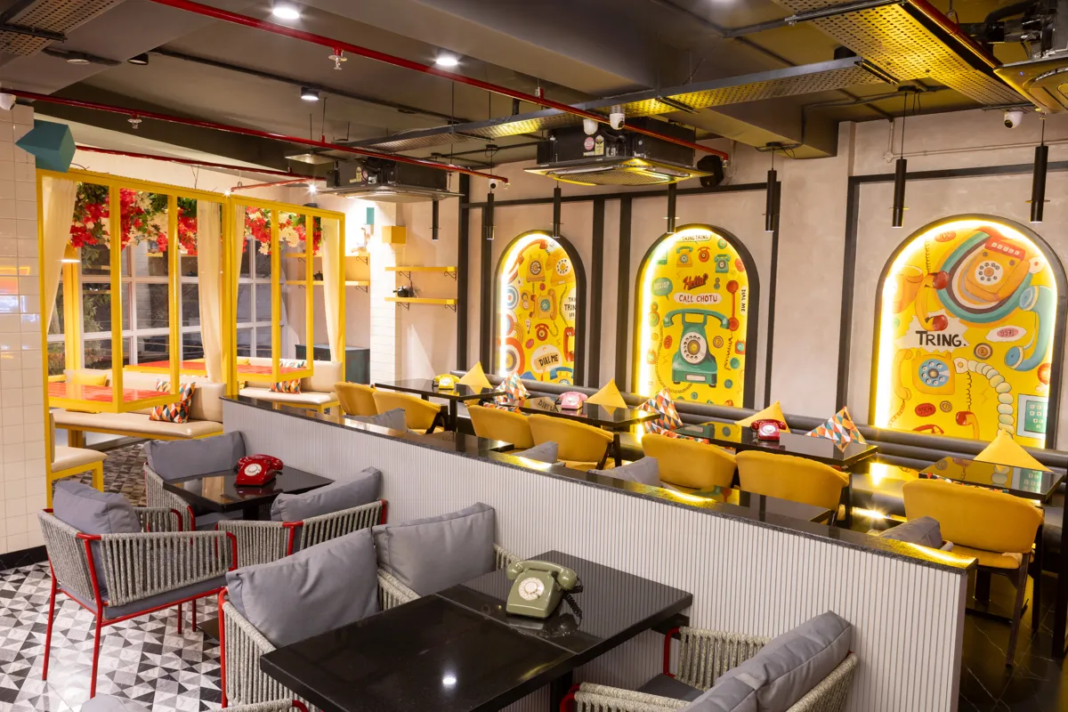 Call Chotu Kailash Colony dining room with mural arches