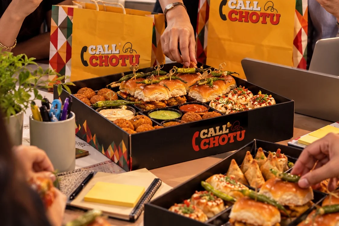 Call Chotu party boxes on an office table